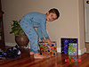 Tyler starting to open another present