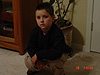 Tyler in his uniform and sweater