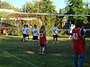 The kids waiting for the serve