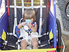 Jordan drinking some juice in her bike trailer
