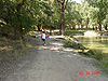 Tyler following Ken around the fishing pond