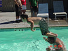 Tyler jumping off Ken's shoulders