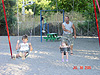 Tyler and Jordan on the swings
