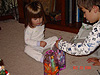Tyler helping Jordan with her Barbies