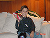 Tyler holding up his present