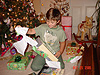 Tyler opening up a magic set from his grandma