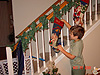 Tyler helping Jordan look in her stocking