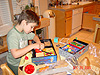 Tyler playing with his magic sets