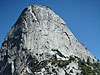 Liberty Cap showing behind the bridge at the top of Nevada Falls