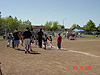 The teams going over to each other after the game