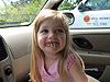 Jordan trying on funny teeth in the car
