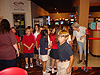 The kids getting in line for their shoes