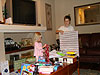 Jordan and Tyler opening their Christmas gifts