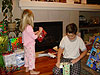 Jordan and Tyler opening their Christmas gifts