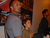 Ken, Jordan, and Tyler in line for the Monster's Inc. ride