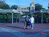 Ken, Tyler, and a pregnant Tanya in front of Disneyland