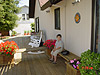 Tyler relaxing on the back porch