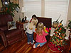 Jordan and Catelyn looking at the toys