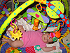 Jordan asleep on her butterfly mat