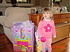 Jordan next to her gifts
