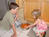 Tyler and Jordan eating some snacks before the party