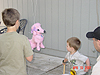 Dave helping Hunter hit the pinata