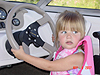 Jordan driving the boat