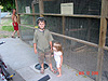 Ken, Tyler, and Jordan feeding the chickens