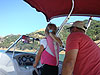 Ken helping Jordan drive the boat