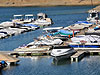 Ken covering our boat in the marina