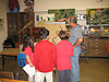 The kids watching the snake