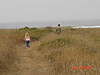 Jordan and Tyler walking to the beach