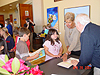 Ashlee getting her book signed