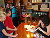 Kyra getting her book signed