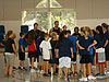 The coach talking to the kids