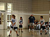 The kids waiting for the serve