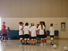 The coach talking to the kids