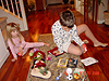 Jordan and Tyler checking their Christmas stockings