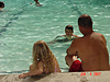 Jordan, Tyler, and Ken swimming at the lodge pool