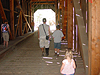 Jordan, Ken, and Tyler walking through a covered bride at Wawona