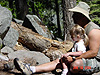 Ken and Jordan feeding a squirrel